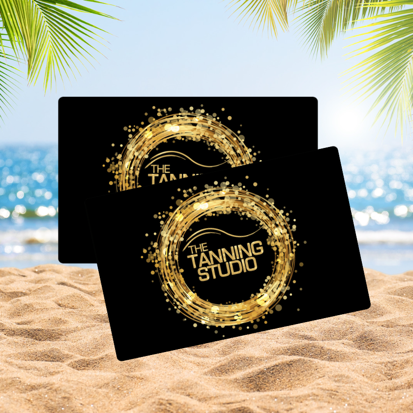 Tanning Studio Gift Cards over beach background.